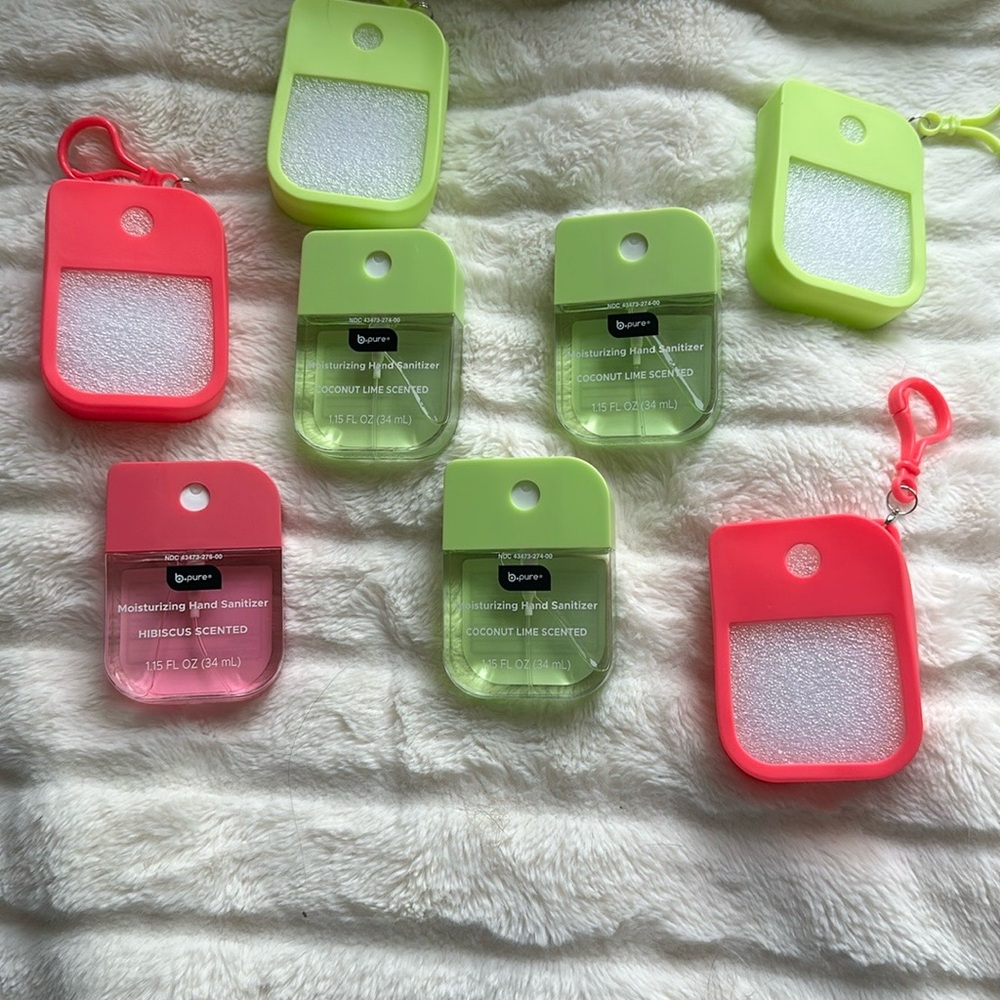 Green and Pink Hand sanitizer and holders (4SETS). VERY HARD TO FIND!  VIRAL